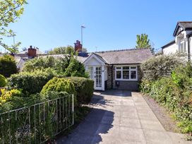 A front view of a house with garden at Ty Cerrig Dyserth