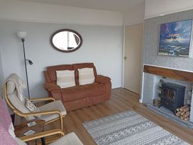 A living room with a sofa and an armchair at Dubrovnik 