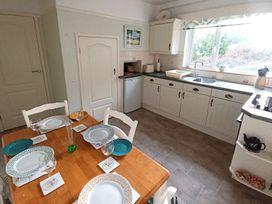 A kitchen with table set for dining at Dubrovnik