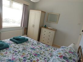 A bedroom with a bed and furniture at Dubrovnik