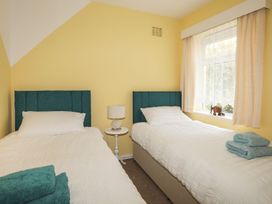 A bedroom with two beds and a nightstand at Dubrovnik