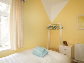 A bedroom with a bed and towels on top at Dubrovnik