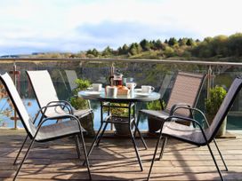 A table with coffee and croissants on a deck at Boavista in Carnforth