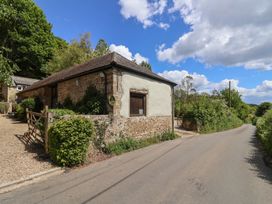 A stone building beside a road at Pottery Barn in Branscombe