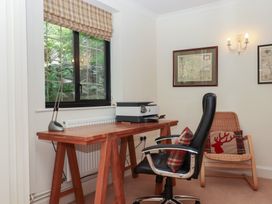 An office with a desk and chair at Sandsgate, Spinster's Rock, near Chagford