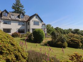 A house with a balcony and garden at Sandsgate near Spinster's Rock, near Chagford