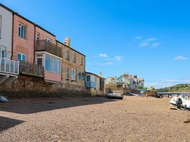 A view of houses by the beach at The Dolphins in Shaldon
