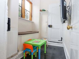 A small room with a table and chairs at Hornshayne Farmhouse, Farway, near Honiton
