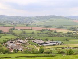 A view of farm buildings and fields at Hornshayne Farmhouse, Farway, near Honiton