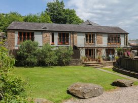 A house with balconies and garden at Fixit Cottage in Kingsbridge