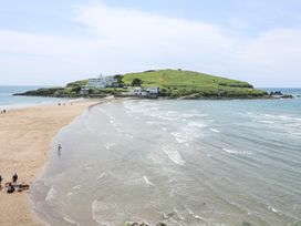 A view of an island with sand and ocean at 27 Burgh Island Causeway in Bigbury-on-Sea