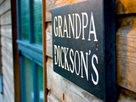 A sign with the name Grandpa Dickson's at Little Petherick