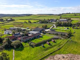 An outdoor area with houses and fields at Carters in Staintondale