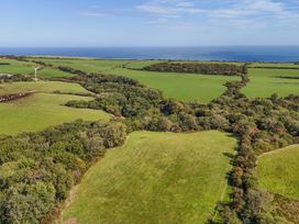 A landscape view of fields and ocean at Carters in Staintondale