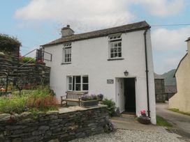 A house exterior with garden at Rose Cottage Broughton-In-Furness