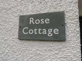 A sign reading Rose Cottage at Rose Cottage in Broughton-In-Furness