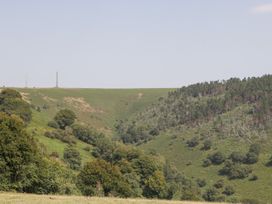 A landscape with hills and trees at Penrhiwarwydd Barn Pontywaun