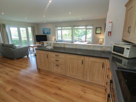 A kitchen with modern fixtures and furnishings at The Meadow in Feock near Carnon Downs