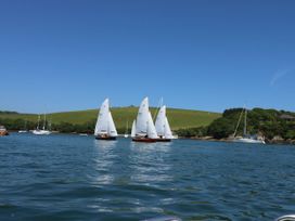 Sailboats on water near a shoreline at Avenue Park Villa in Torquay