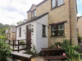 A house exterior with a door and windows at Tranquility in Falmouth