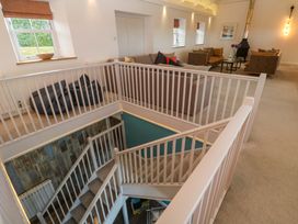 A staircase and seating area at Silvermine House in Charlestown
