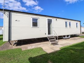 A caravan with steps and windows at K2 Static Caravan in 