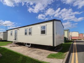 A static caravan with steps and windows at K2 Static Caravan