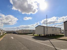 An outdoor view of caravans on a road at K2 Static Caravan