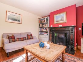 A living room with a sofa and a coffee table at Elm View Chipping Campden