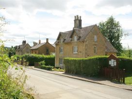 Exterior view of multiple houses along a street at Elm View in Chipping Campden
