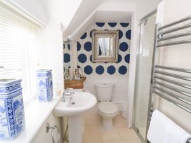 A bathroom with a shower and sink at Fairview Cottage in Milton-Under-Wychwood