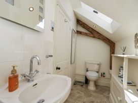 A bathroom with a sink and toilet at The Old Reading Room Bledington near Stow-on-the-Wold