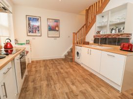 A kitchen with appliances and artwork at Rojoy in Salisbury