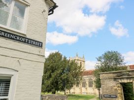 A view of street signs and a church at Rojoy in Salisbury