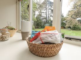 A basket with items on a counter in the kitchen at Droop Farm Cottage Droop near Hazelbury Bryan