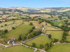An aerial view of fields and hills at Meadow Retreat in Nantmel near Rhayader