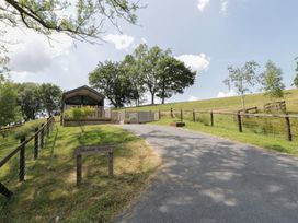An outdoor view of a path leading to Meadow Retreat in Nantmel near Rhayader