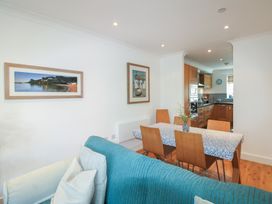 A dining room with a table and chairs at 16 Bolt Head Salcombe