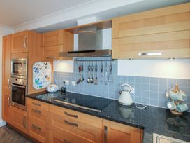 A kitchen with appliances and utensils at 16 Bolt Head in Salcombe
