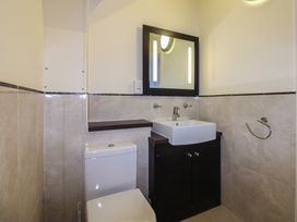 A bathroom with a sink and toilet at 16 Bolt Head in Salcombe