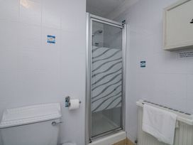 A bathroom with a shower and toilet at 19 Bolt Head, Salcombe