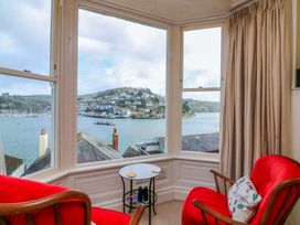 A living room with a view of the water at 3 Dartview in Dartmouth