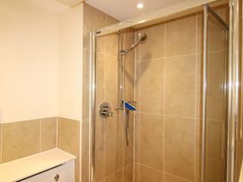 A shower with glass enclosure at 4 Bolt Head Salcombe