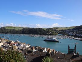 A view of a marina with boats and hills at Dart Views in Dartmouth