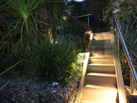 A staircase surrounded by plants at Dart Views in Dartmouth