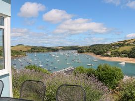 A view of boats on water surrounded by hills at Edinburgh House in Salcombe