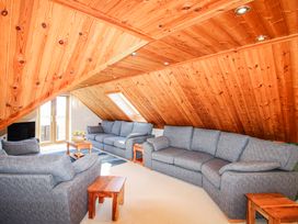 A living room with sofas and a table at The Station in Bolberry