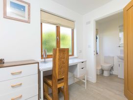 A bathroom with a toilet and sink at Mellydonen Beder Del (Melly), Tor Down Quarry, St Breward