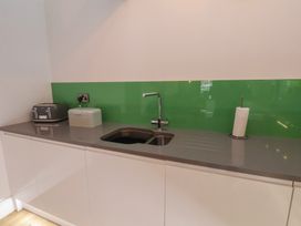 A kitchen with a sink and worktop at Repton @ Engine Shed Whitby