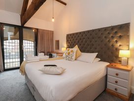 A bedroom with a bed and window at Repton @ Engine Shed in Whitby